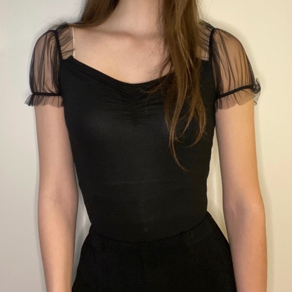 Sheer sleeve top